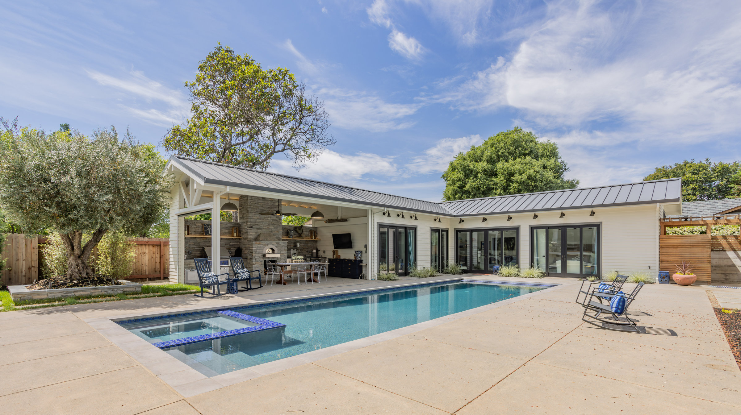 Matheson Residence exterior with outdoor kitchen pavilion