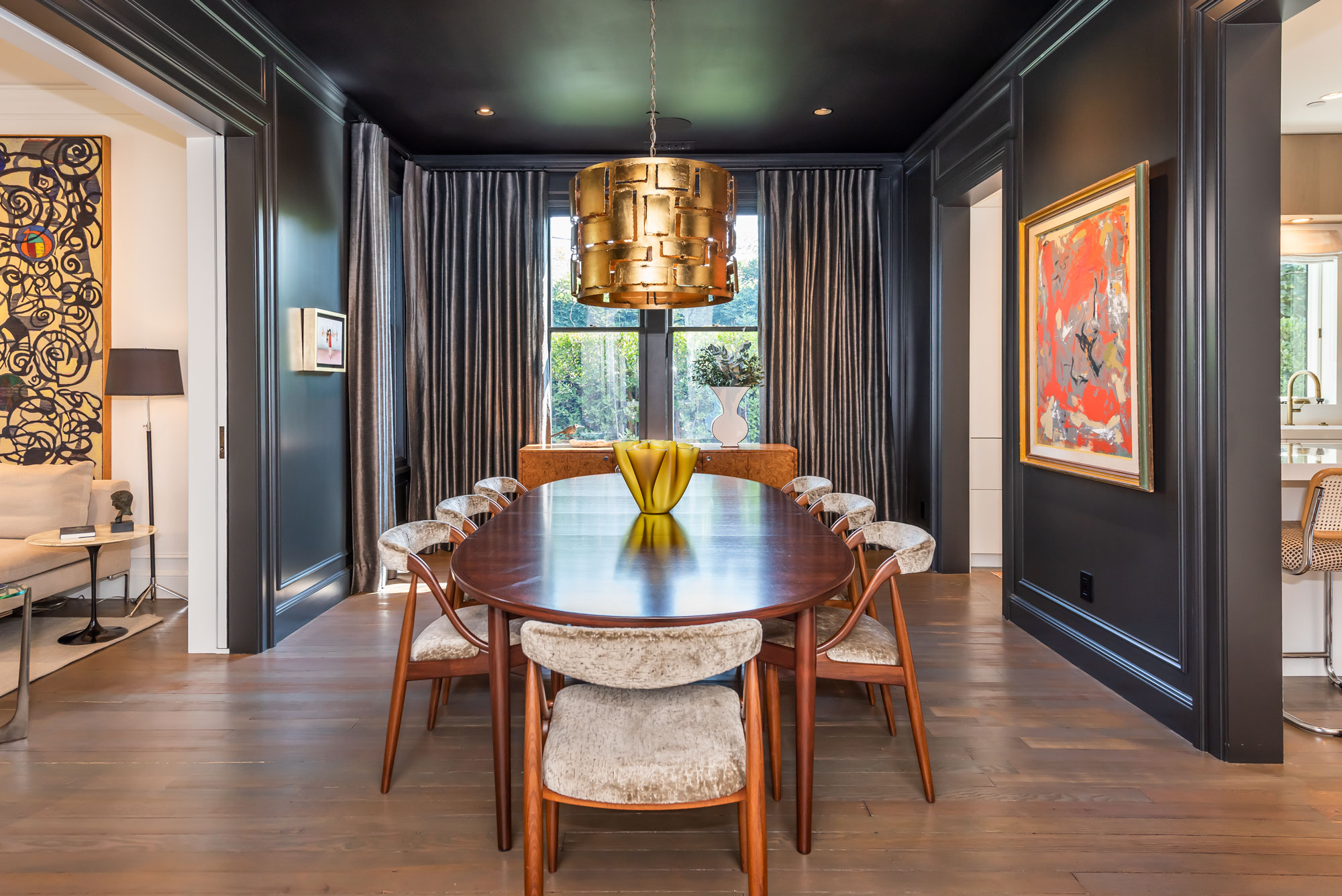 Formal dining room with gold chandelier